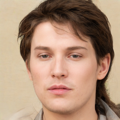 Neutral white young-adult male with medium  brown hair and brown eyes