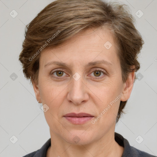 Joyful white adult female with short  brown hair and grey eyes