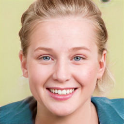 Joyful white young-adult female with medium  brown hair and blue eyes