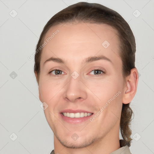 Joyful white young-adult female with short  brown hair and brown eyes