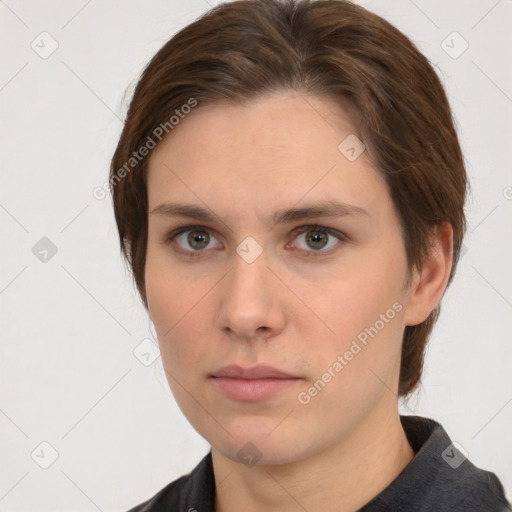 Neutral white young-adult female with short  brown hair and brown eyes