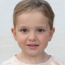 Joyful white child female with short  brown hair and brown eyes