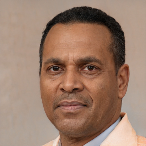 Neutral latino adult male with short  black hair and brown eyes