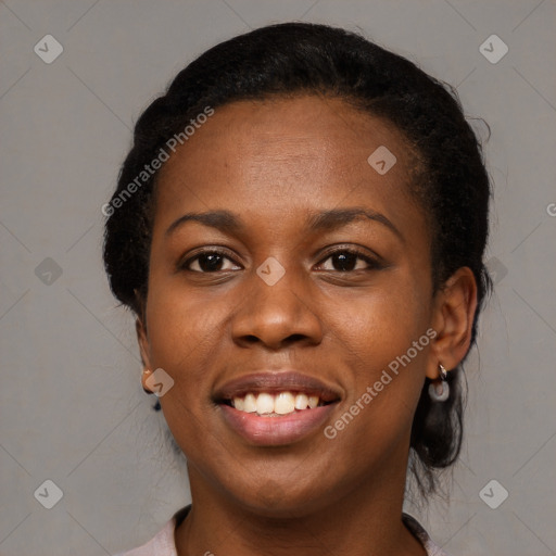 Joyful black young-adult female with medium  black hair and brown eyes