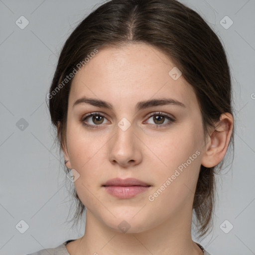 Neutral white young-adult female with medium  brown hair and brown eyes