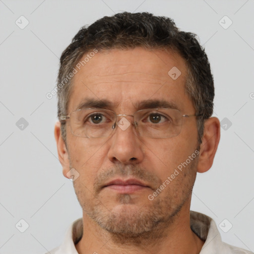 Neutral white adult male with short  brown hair and brown eyes