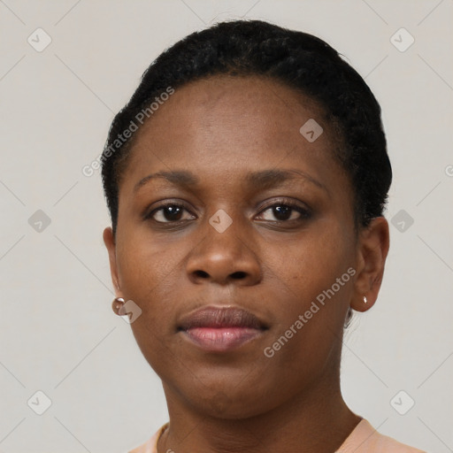 Neutral black young-adult female with short  brown hair and brown eyes