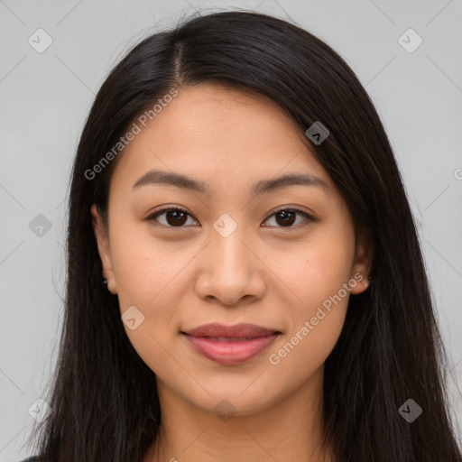 Joyful latino young-adult female with long  brown hair and brown eyes