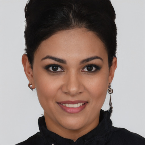 Joyful latino young-adult female with short  brown hair and brown eyes
