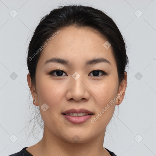 Joyful asian young-adult female with medium  brown hair and brown eyes