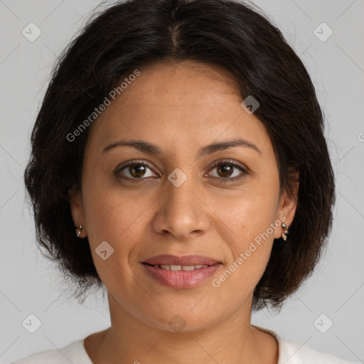 Joyful white adult female with medium  brown hair and brown eyes