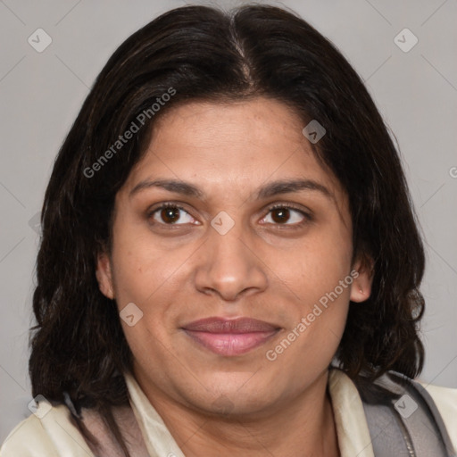 Joyful white adult female with medium  brown hair and brown eyes