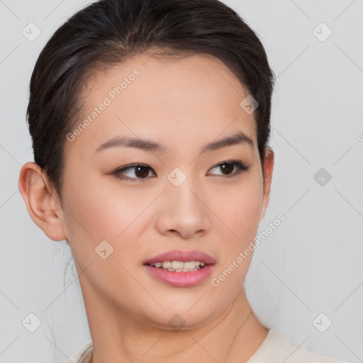 Joyful asian young-adult female with short  brown hair and brown eyes