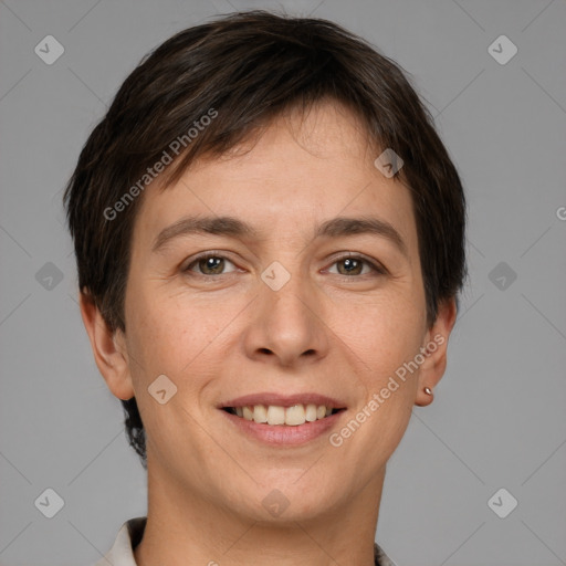 Joyful white adult female with short  brown hair and brown eyes