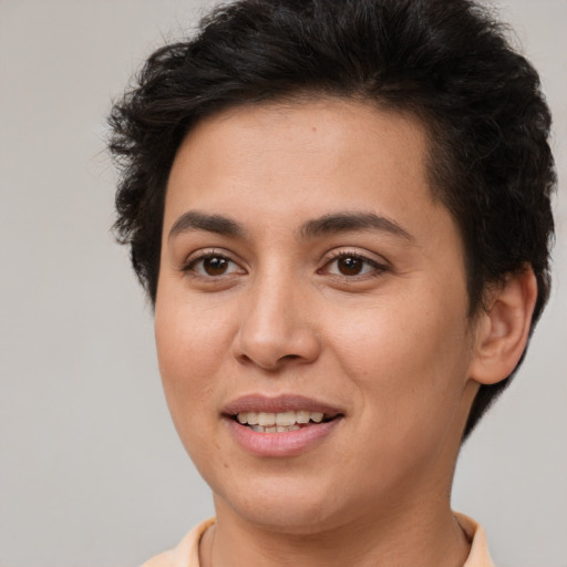 Joyful white young-adult female with short  brown hair and brown eyes