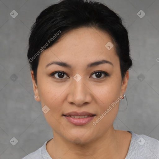 Joyful asian young-adult female with short  black hair and brown eyes