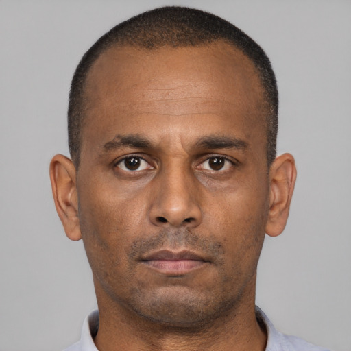 Neutral black adult male with short  brown hair and brown eyes