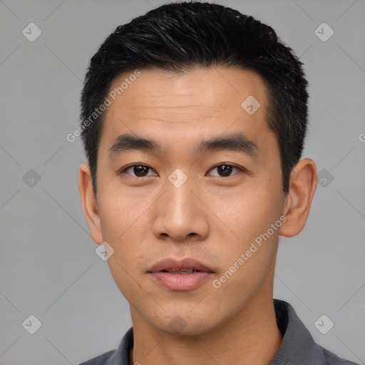 Neutral asian young-adult male with short  black hair and brown eyes