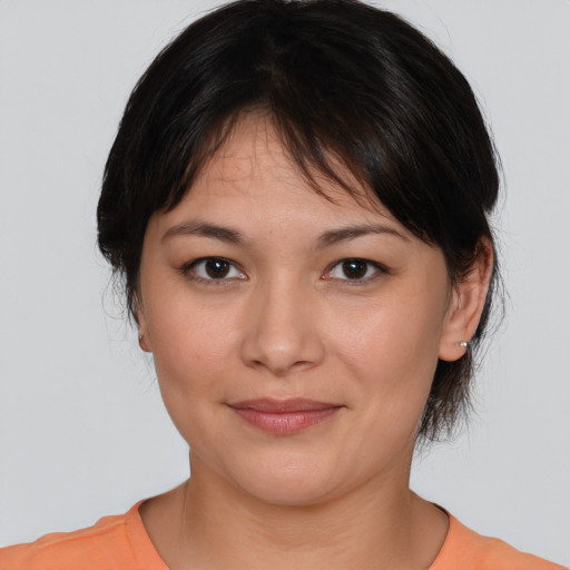 Joyful white young-adult female with medium  brown hair and brown eyes