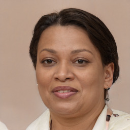 Joyful white adult female with short  brown hair and brown eyes