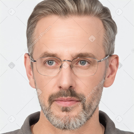 Neutral white middle-aged male with short  brown hair and brown eyes