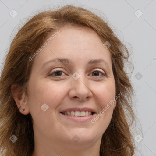 Joyful white adult female with long  brown hair and brown eyes