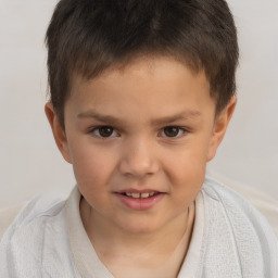 Joyful white child male with short  brown hair and brown eyes