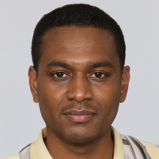 Neutral black young-adult male with short  black hair and brown eyes