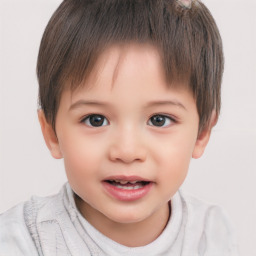 Joyful white child male with short  brown hair and brown eyes