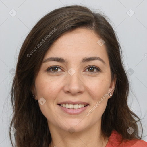 Joyful white young-adult female with long  brown hair and brown eyes