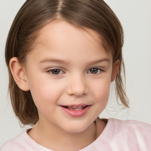 Joyful white child female with medium  brown hair and brown eyes