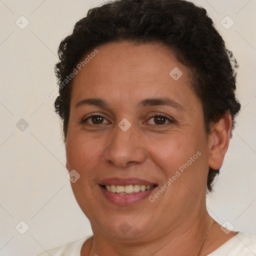 Joyful white adult female with short  brown hair and brown eyes