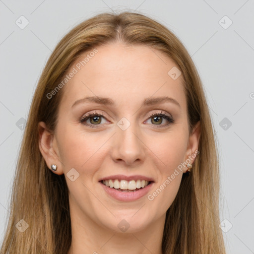 Joyful white young-adult female with long  brown hair and green eyes