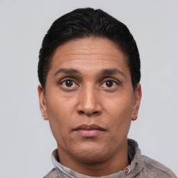 Neutral white adult male with short  black hair and brown eyes