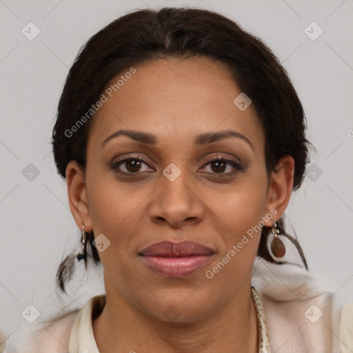 Joyful latino adult female with medium  brown hair and brown eyes