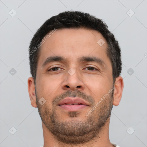 Neutral latino young-adult male with short  brown hair and brown eyes