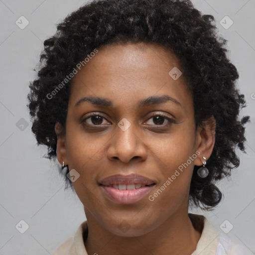 Joyful black young-adult female with medium  black hair and brown eyes