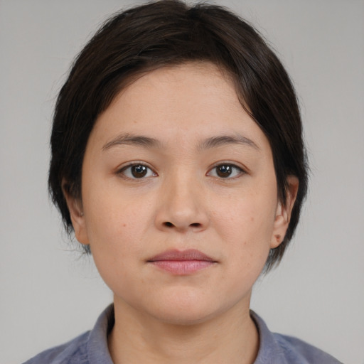 Neutral asian young-adult female with medium  brown hair and brown eyes