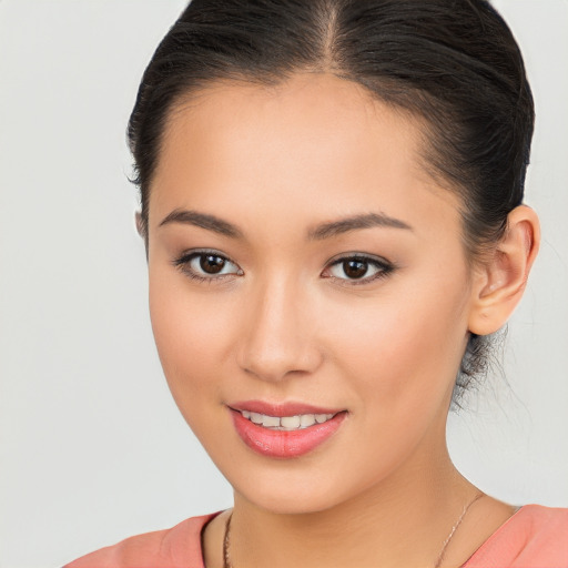 Joyful white young-adult female with long  brown hair and brown eyes