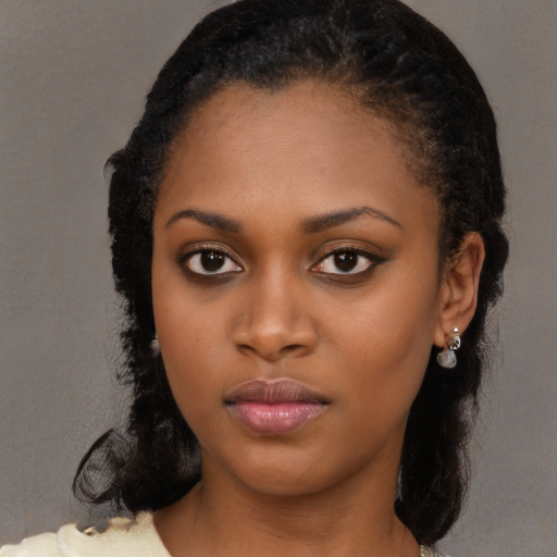 Neutral black young-adult female with long  black hair and brown eyes