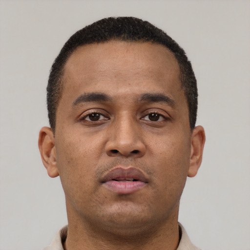 Neutral latino young-adult male with short  brown hair and brown eyes