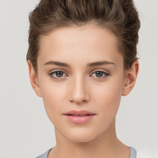 Neutral white young-adult female with short  brown hair and brown eyes