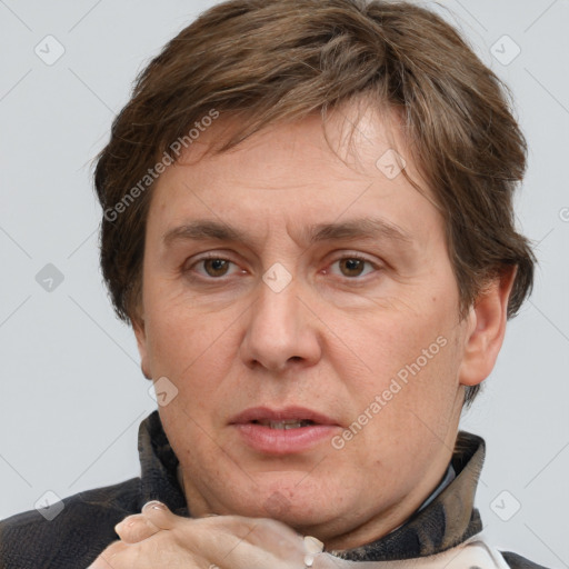 Joyful white adult male with short  brown hair and grey eyes