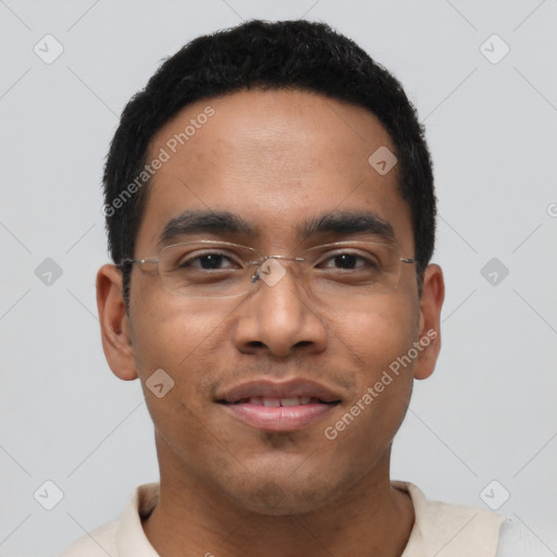 Joyful latino young-adult male with short  black hair and brown eyes