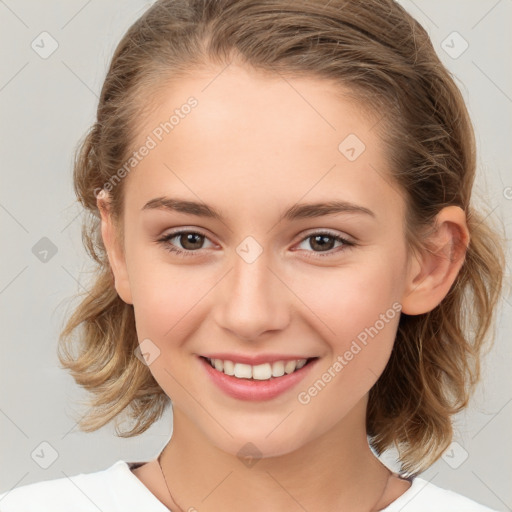 Joyful white child female with medium  brown hair and brown eyes