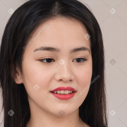 Joyful asian young-adult female with long  brown hair and brown eyes