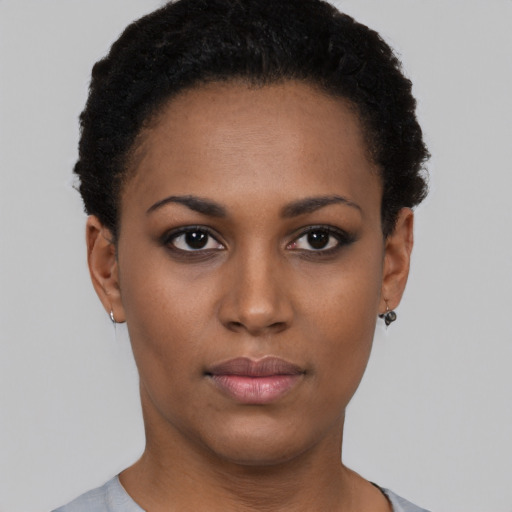 Neutral black young-adult female with short  black hair and brown eyes