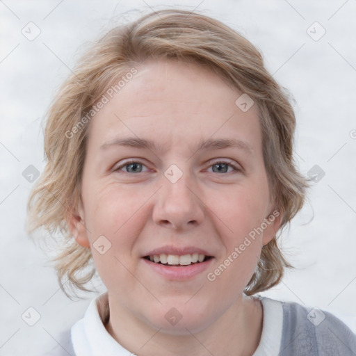 Joyful white young-adult female with medium  brown hair and blue eyes