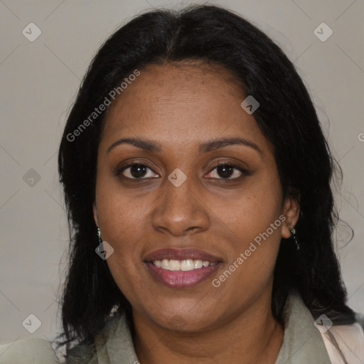 Joyful black adult female with medium  brown hair and brown eyes