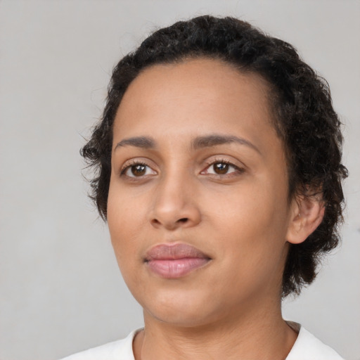 Neutral latino young-adult female with medium  black hair and brown eyes